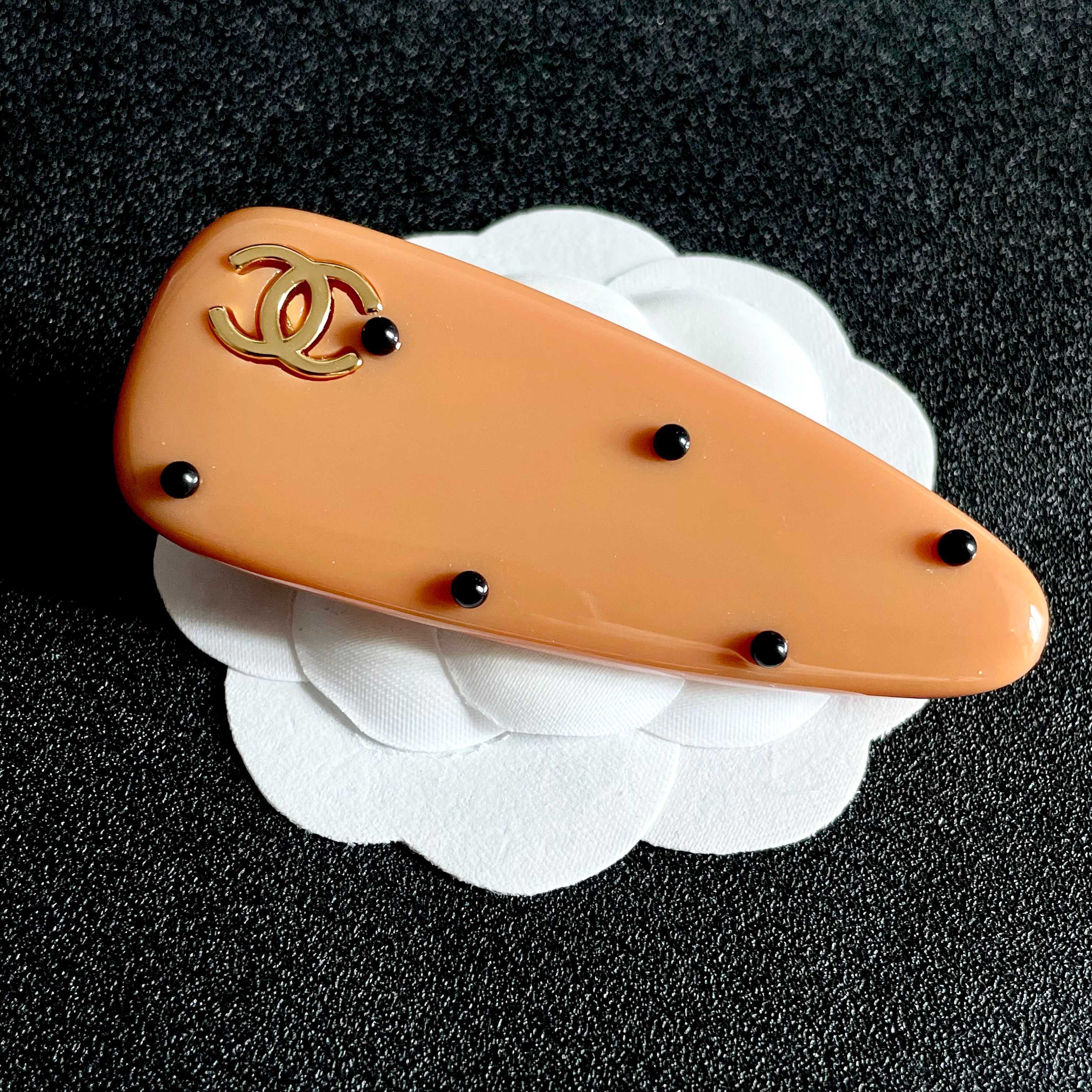 Chanel Orange Hair Clip with Black Dots